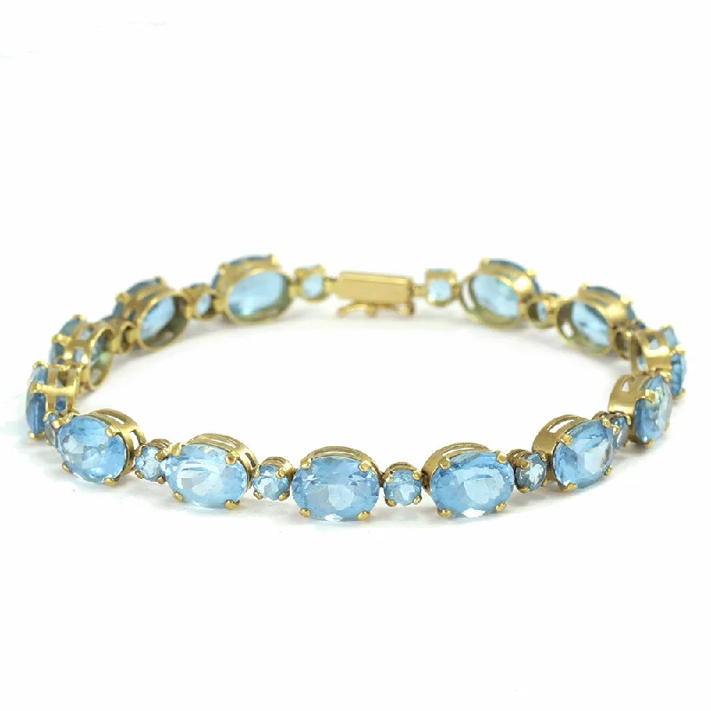 stackable silver bangles -stackable silver bangles -14k yellow gold oval and round blue topaz tennis bracelet